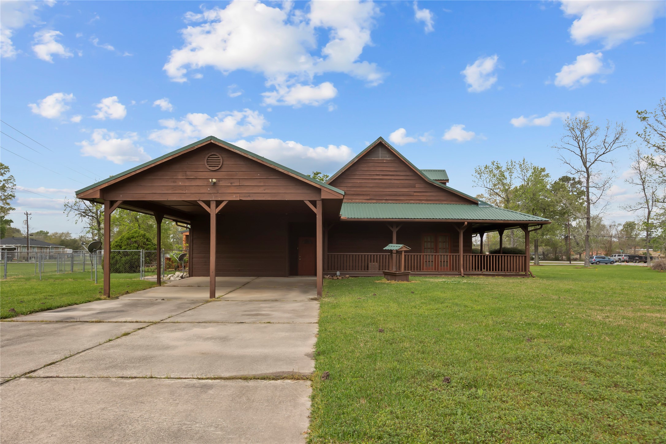 22916 East Martin Drive Porter, TX 77365 - Photo 2 of 43 a front view of a house with garden