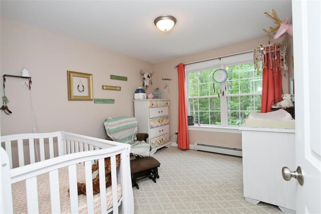 94 Sand Bar Road Windham, ME 04062 - Photo 8 of 24 First floor bedroom with windows...