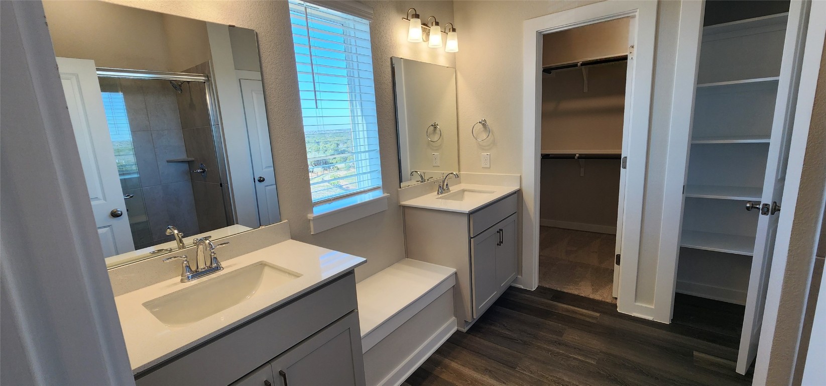 2220 Delano Drive Leander, TX 78641 - Photo 15 of 37 a bathroom with a sink and a mirror