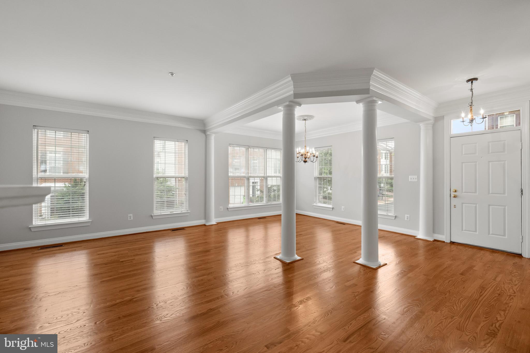 5117 Grimm Drive Alexandria, VA 22304 - Photo 12 of 67 a view of an empty room with wooden floor and a window