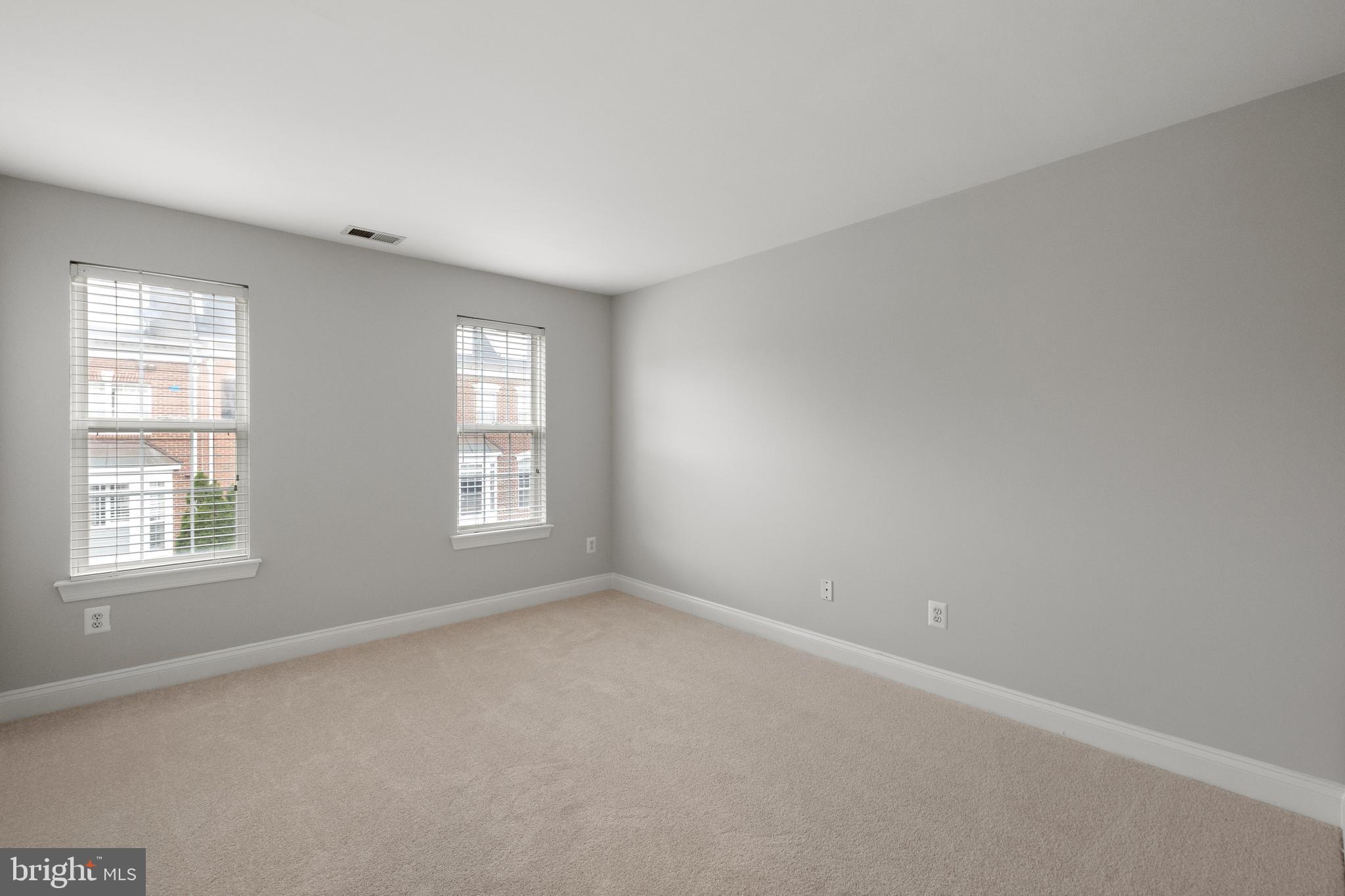 5117 Grimm Drive Alexandria, VA 22304 - Photo 31 of 67 an empty room with windows