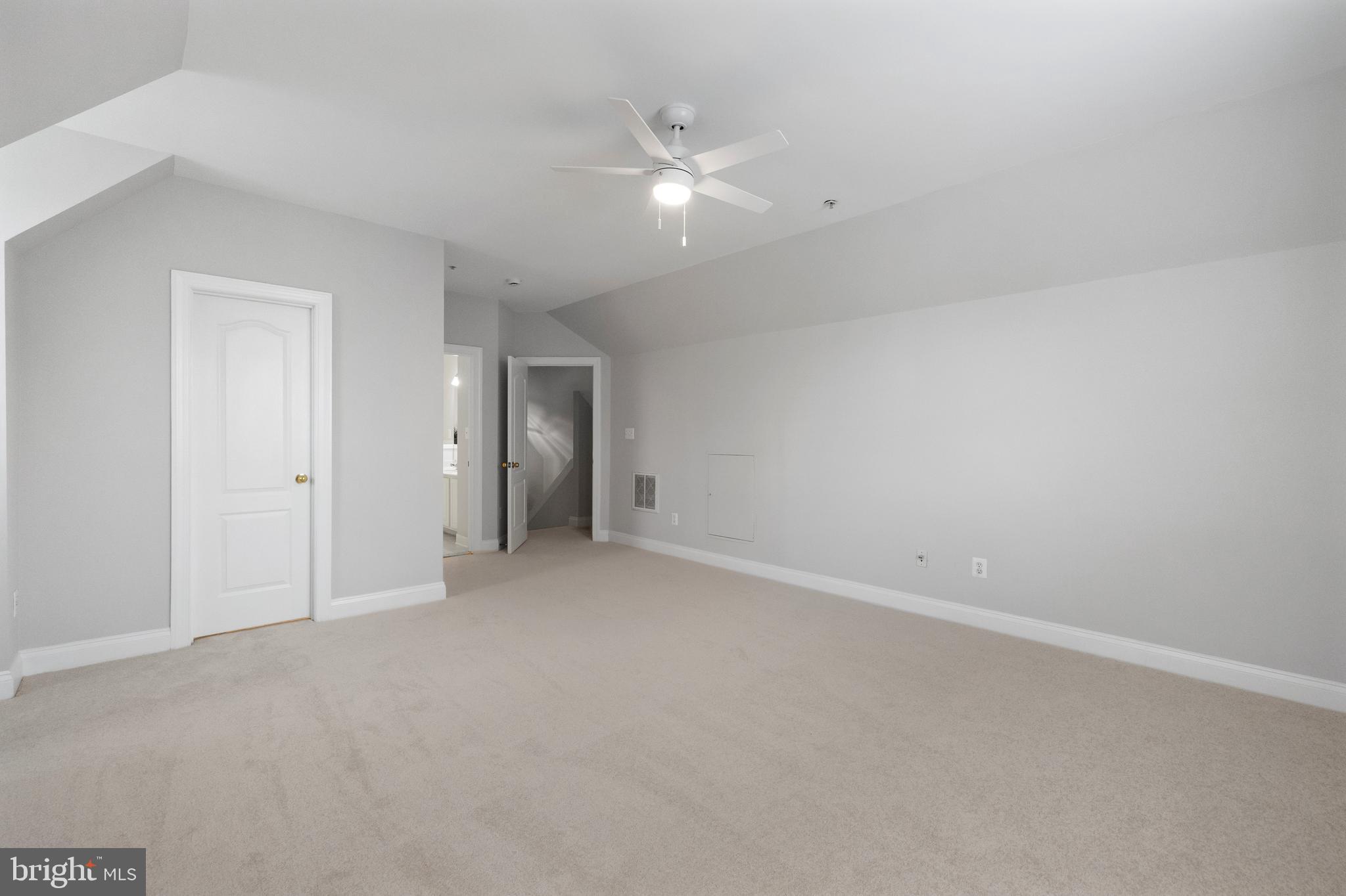 5117 Grimm Drive Alexandria, VA 22304 - Photo 40 of 67 a view of an empty room with a ceiling fan
