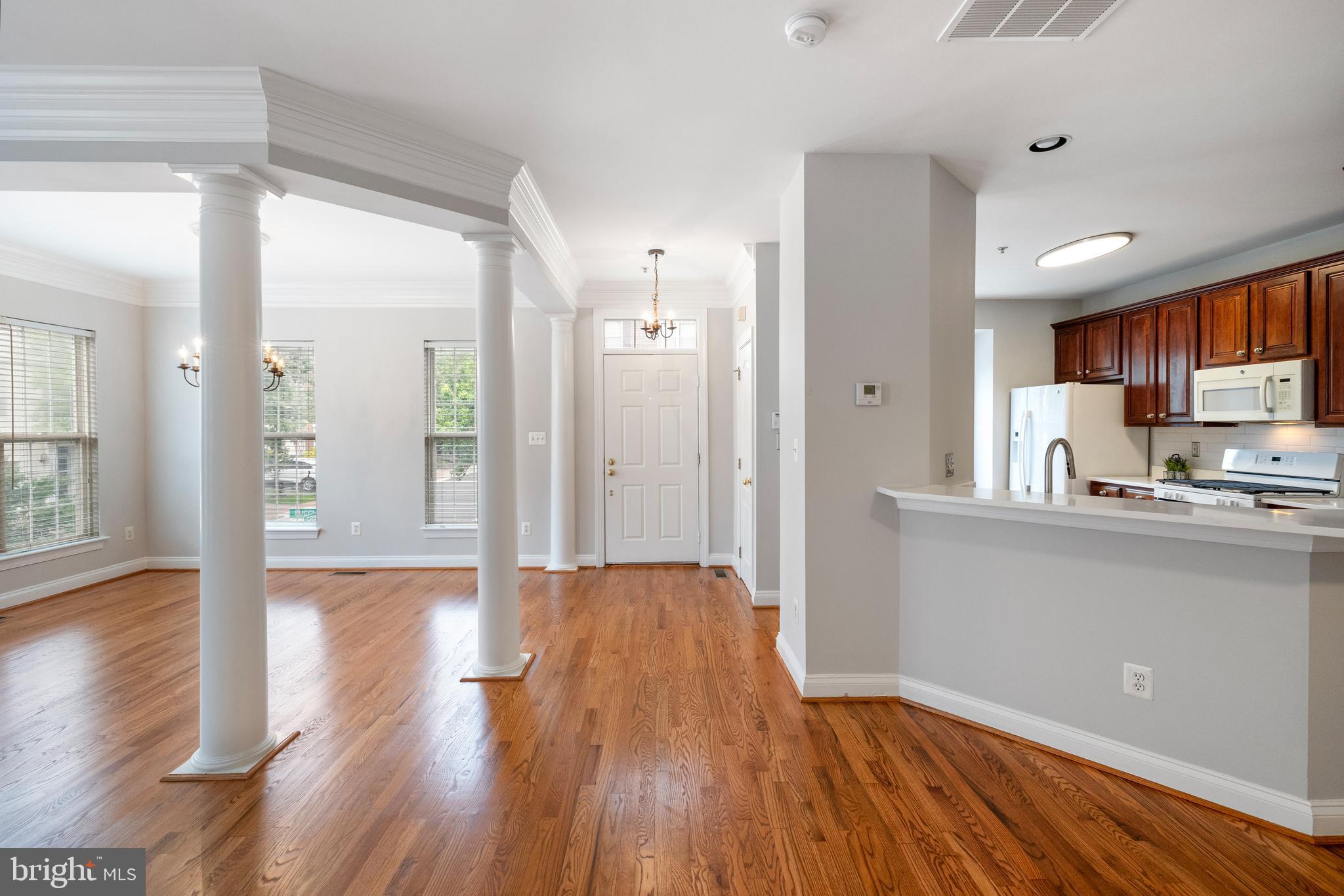 5117 Grimm Drive Alexandria, VA 22304 - Photo 6 of 67 a view of a kitchen cabinets wooden floor and a window