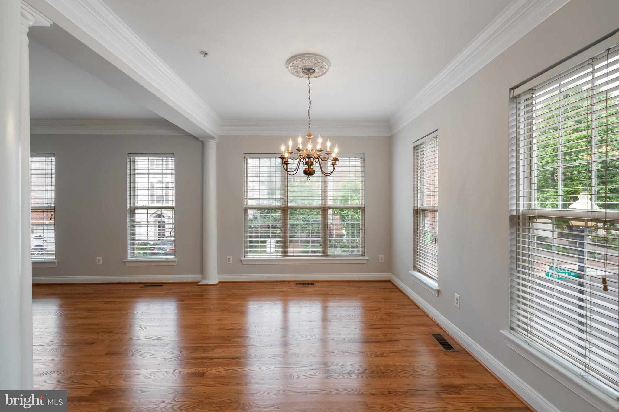 5117 Grimm Drive Alexandria, VA 22304 - Photo 9 of 67 a view of an empty room with wooden floor and a window