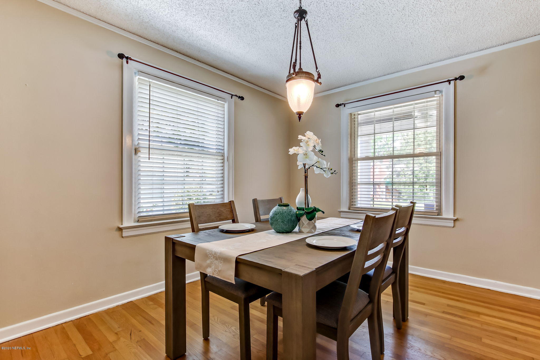 2164 Huntsford Road Jacksonville, FL 32207 - Photo 12 of 34 a view of a dining room with furniture window and wooden floor