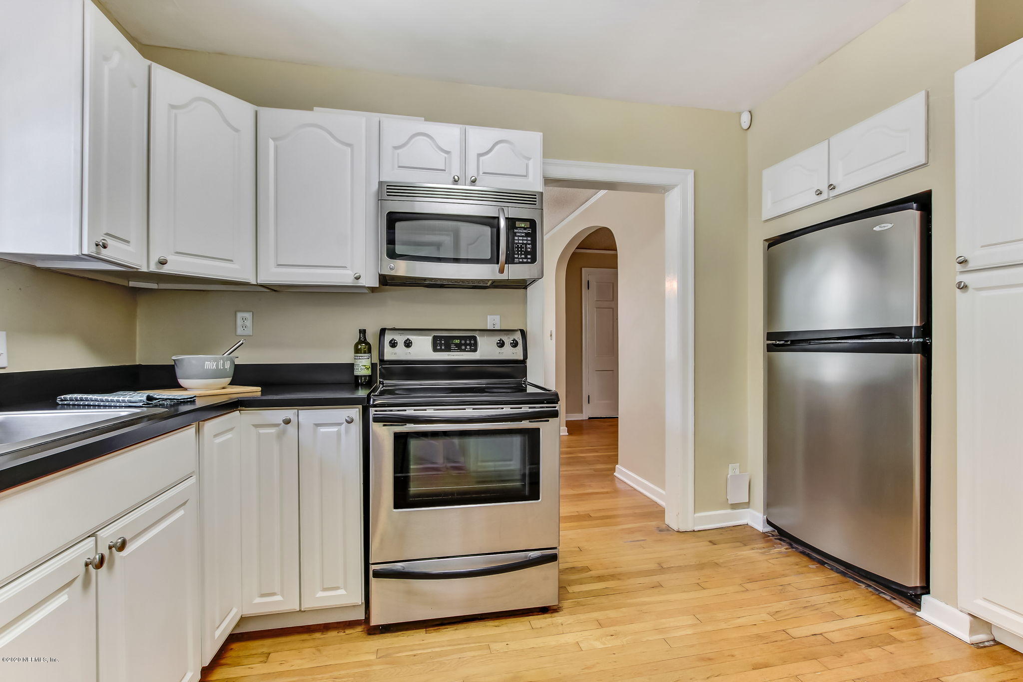2164 Huntsford Road Jacksonville, FL 32207 - Photo 15 of 34 a kitchen with stainless steel appliances granite countertop a refrigerator stove and sink
