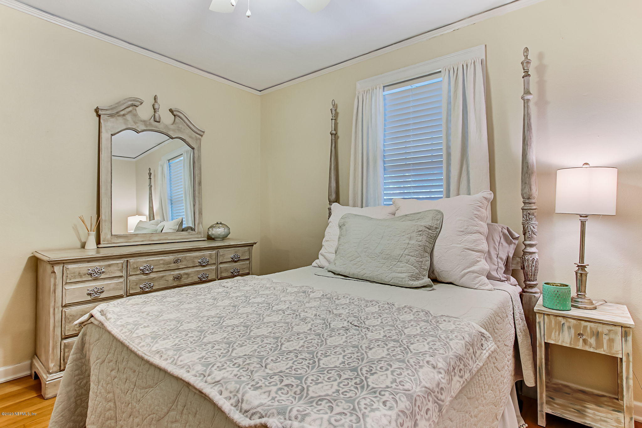 2164 Huntsford Road Jacksonville, FL 32207 - Photo 18 of 34 a bedroom with a bed and a dresser