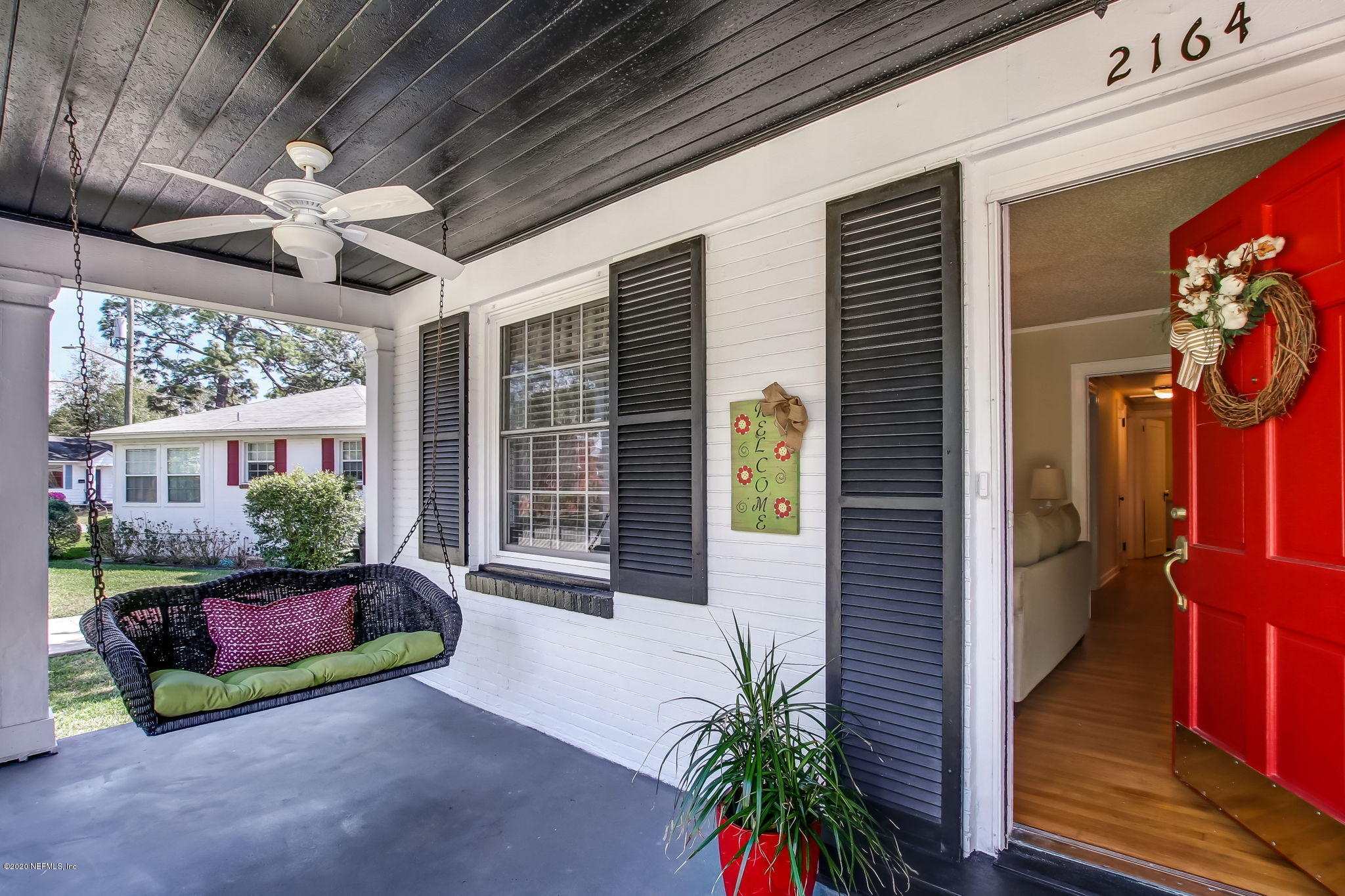2164 Huntsford Road Jacksonville, FL 32207 - Photo 5 of 34 a view of a house with porch and garden