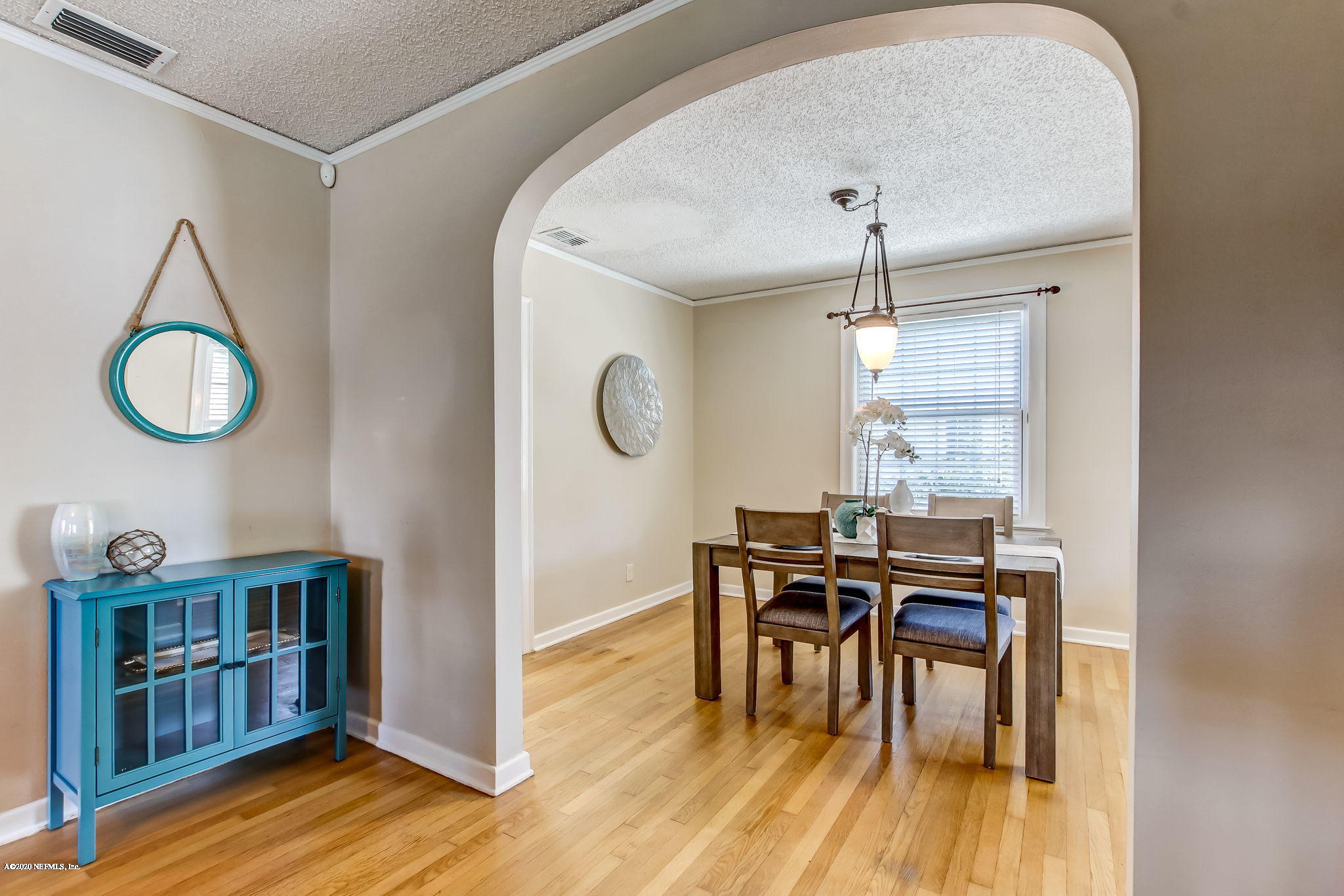 2164 Huntsford Road Jacksonville, FL 32207 - Photo 10 of 34 a view of a dining room with furniture and wooden floor