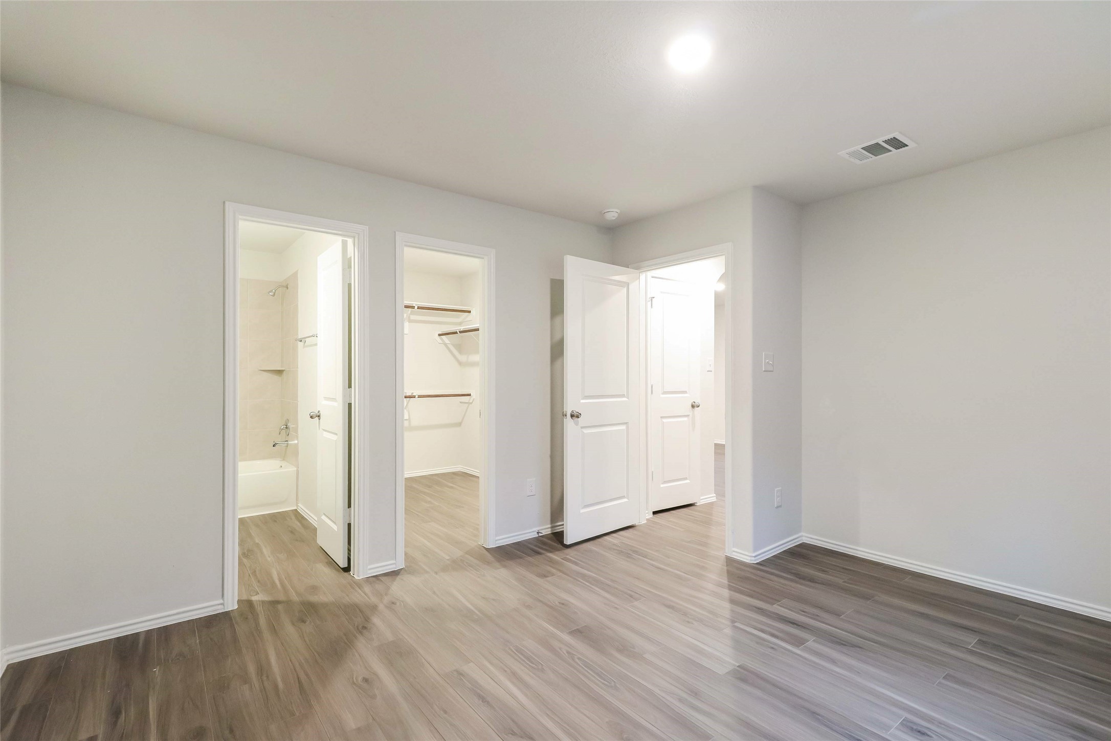 2437 Carp Drive Conroe, TX 77384 - Photo 13 of 17 Photos may be representative of the floor plan and not the exact home. Finishes, layout, and features of the actual property for lease may vary.