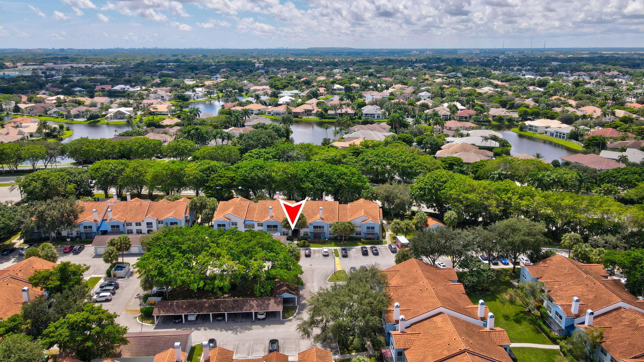 3237 Clint Moore Road, Unit 103 Boca Raton, FL 33496 - Photo 11 of 13 an aerial view of residential houses with outdoor space and trees