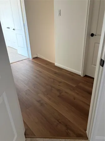 en empty room with windows