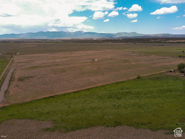 St, Unit 6 Beaver, UT 84713 - Photo 23 of 27 View of rural area featuring a mountain backdrop