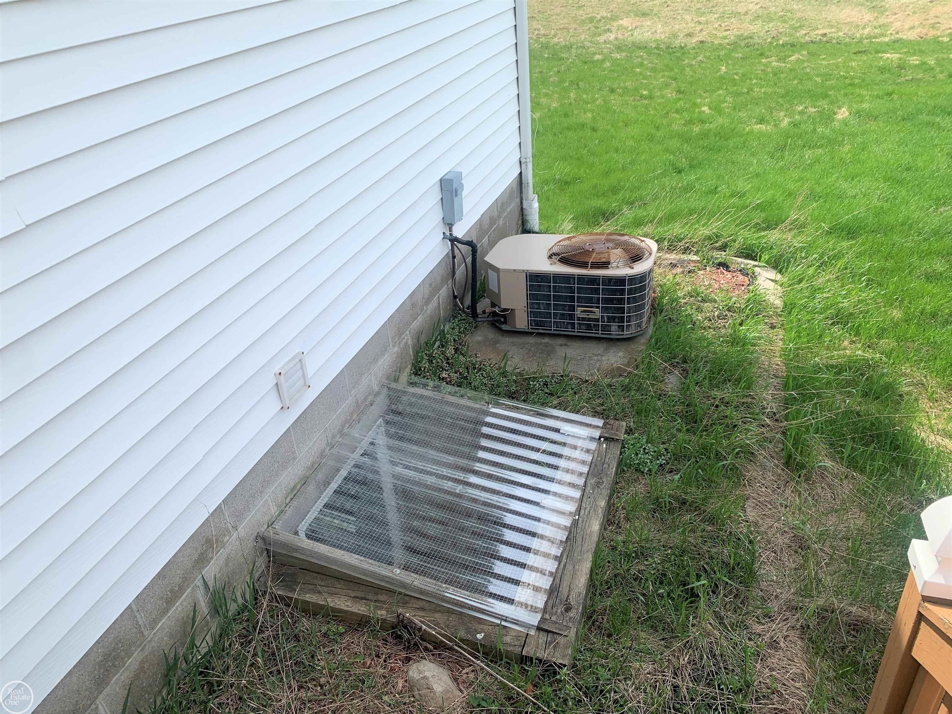 3770 Wagner Road Croswell, MI 48422 - Photo 42 of 44 Egress Window and Air Uni