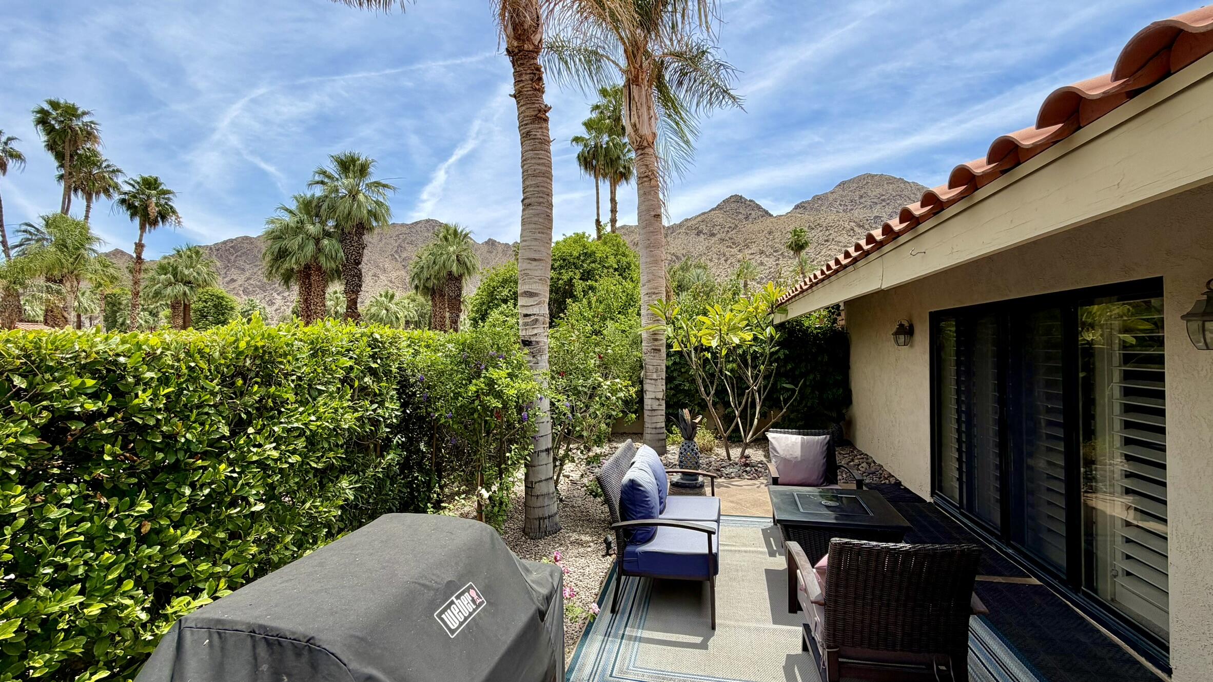 45740 Pueblo Road Indian Wells, CA 92210 - Photo 33 of 61 a view of a balcony with chairs and a potted plant