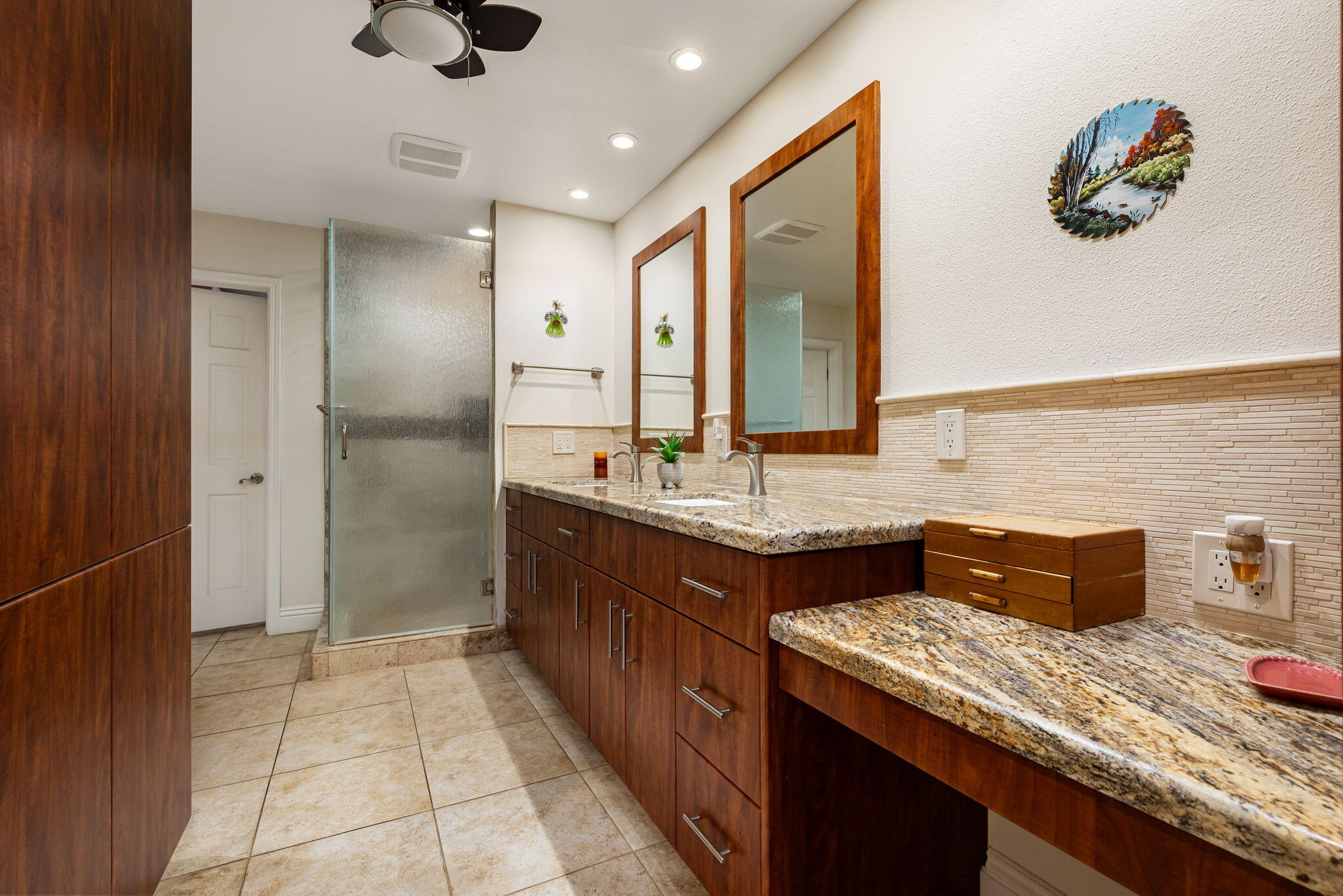 45740 Pueblo Road Indian Wells, CA 92210 - Photo 39 of 61 a bathroom with a granite countertop sink a toilet and mirror