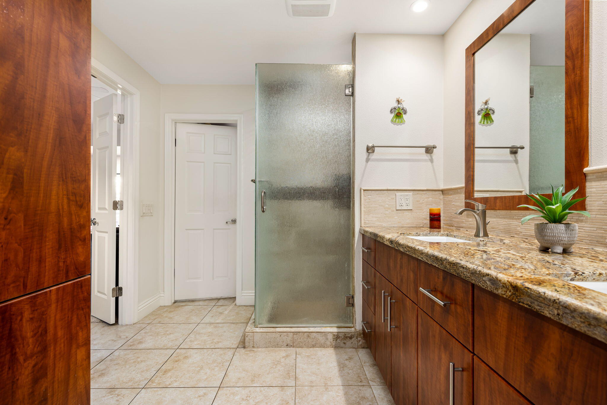 45740 Pueblo Road Indian Wells, CA 92210 - Photo 40 of 61 a bathroom with a granite countertop sink and a mirror