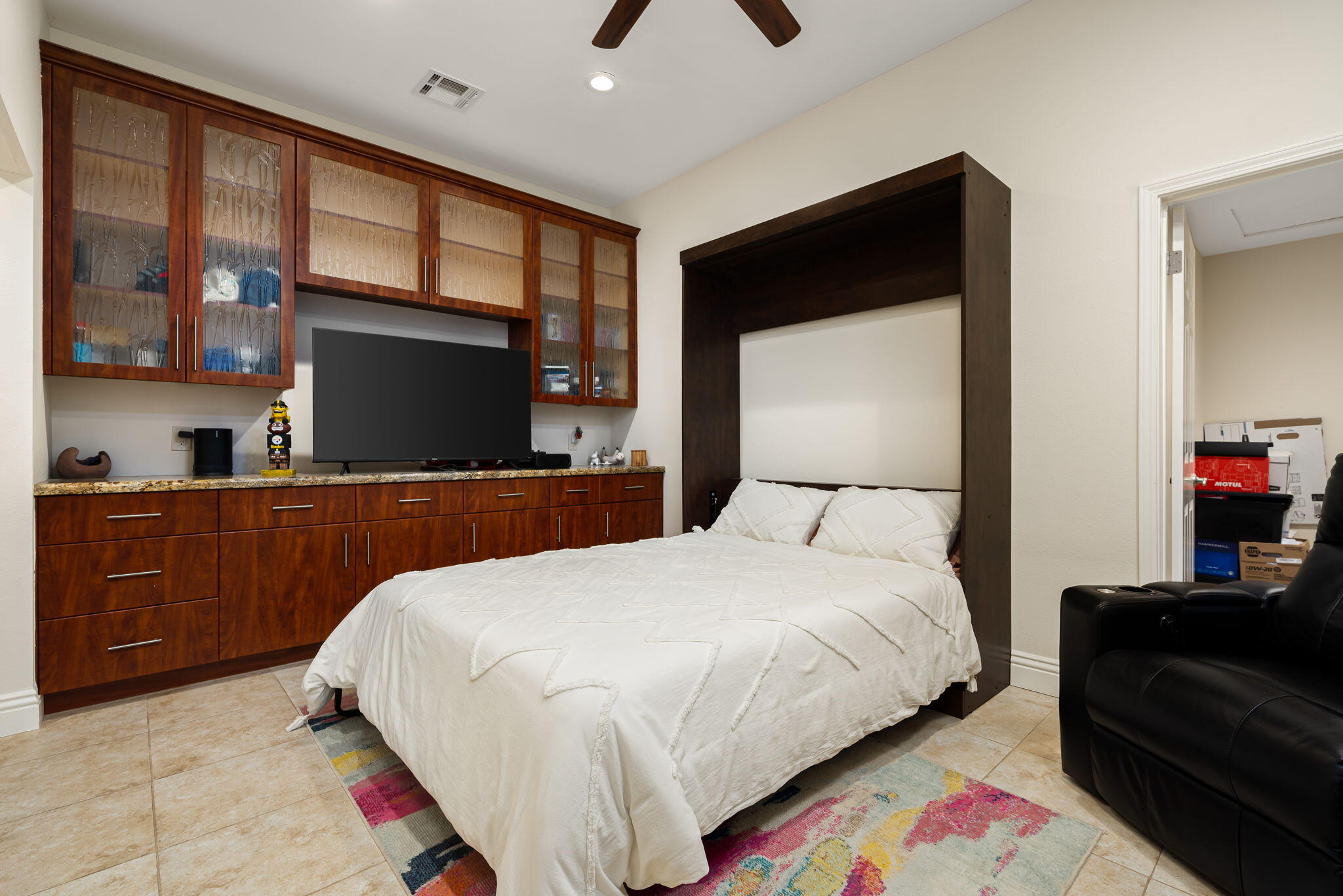 45740 Pueblo Road Indian Wells, CA 92210 - Photo 43 of 61 a bedroom with a bed and a flat screen tv