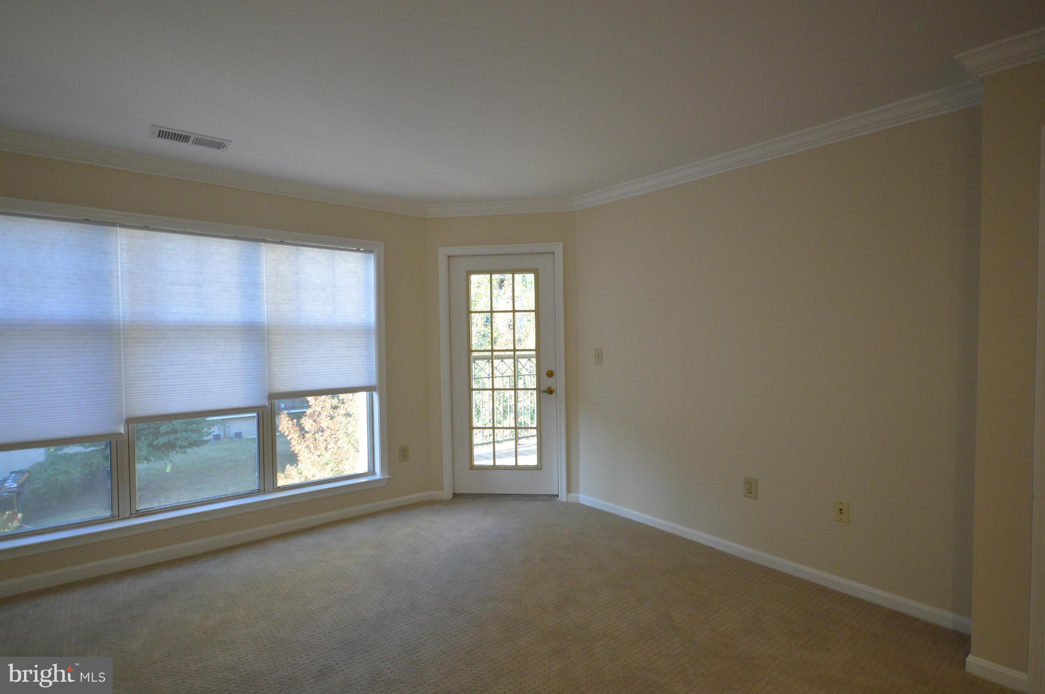5575 Seminary Road, Unit 311 Falls Church, VA 22041 - Photo 11 of 30 an empty room with windows