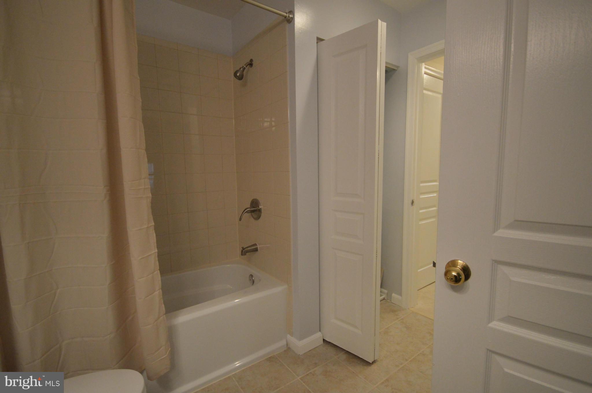 5575 Seminary Road, Unit 311 Falls Church, VA 22041 - Photo 20 of 30 a bathroom with a bathtub