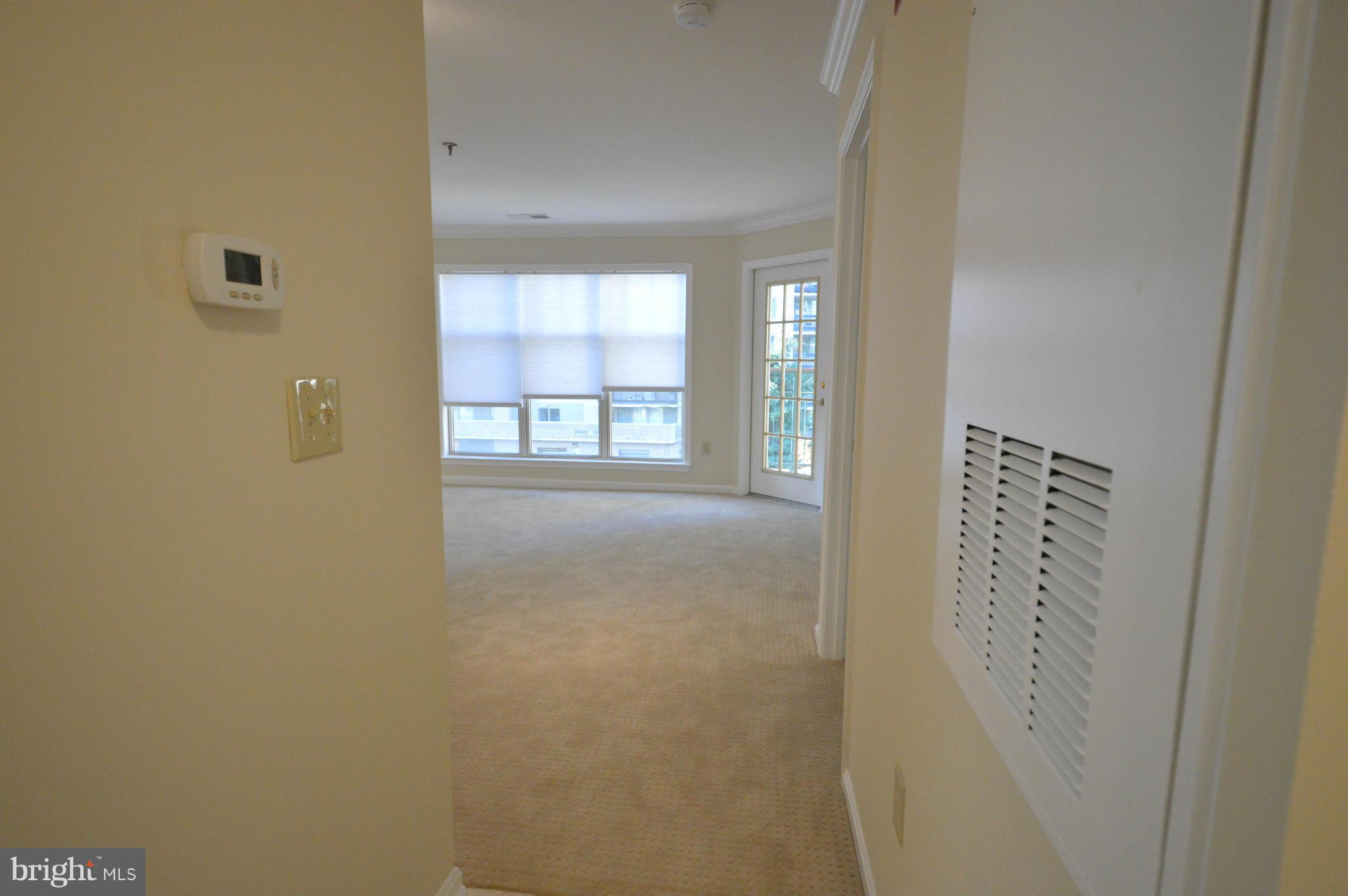 5575 Seminary Road, Unit 311 Falls Church, VA 22041 - Photo 6 of 30 a view of an empty room with a window