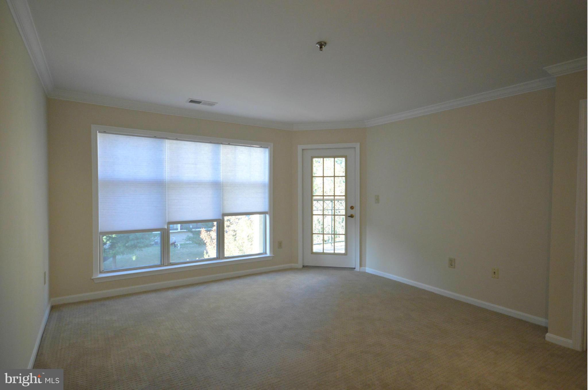 5575 Seminary Road, Unit 311 Falls Church, VA 22041 - Photo 7 of 30 an empty room with a window