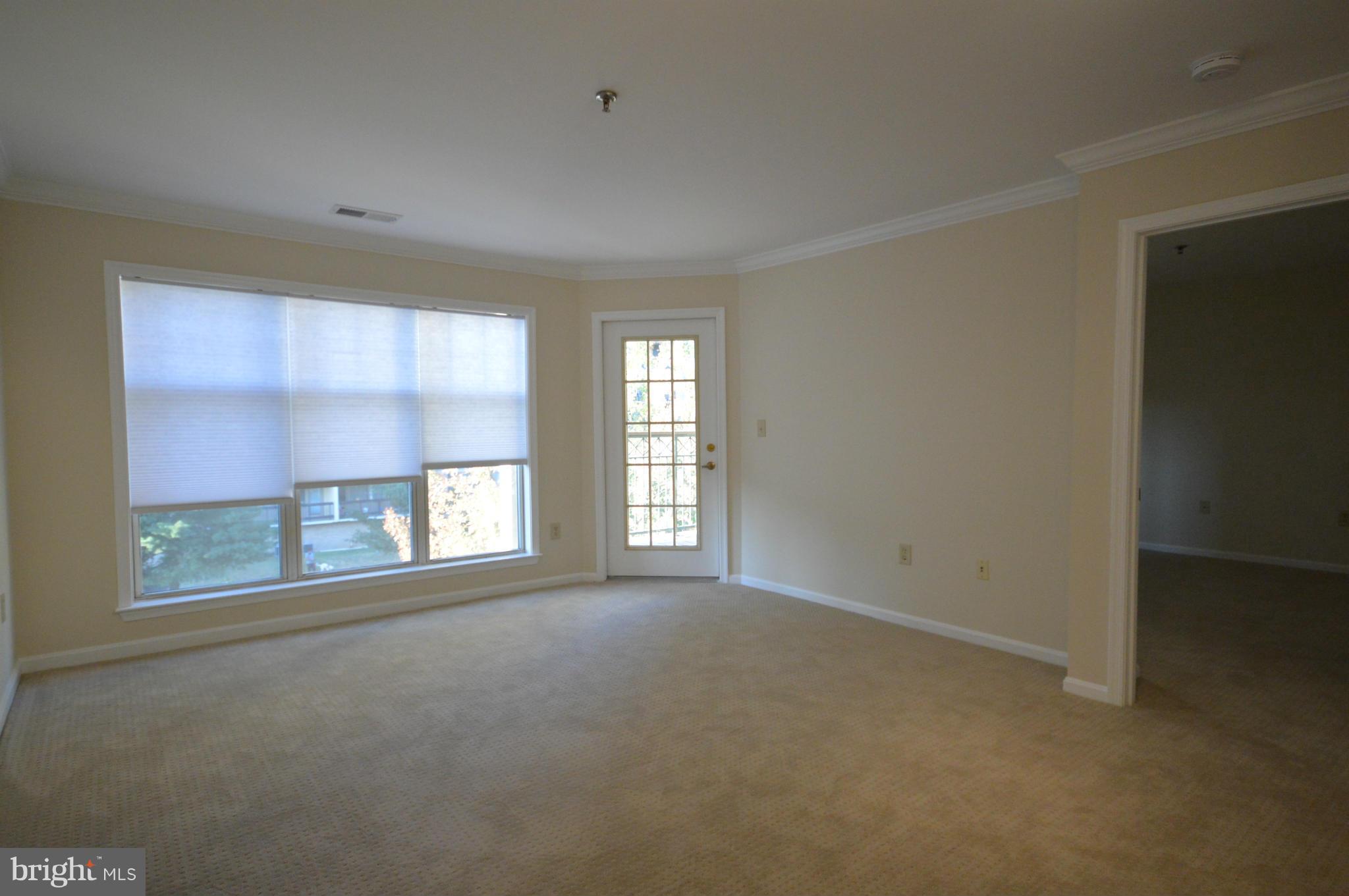 5575 Seminary Road, Unit 311 Falls Church, VA 22041 - Photo 8 of 30 a view of an empty room with a window