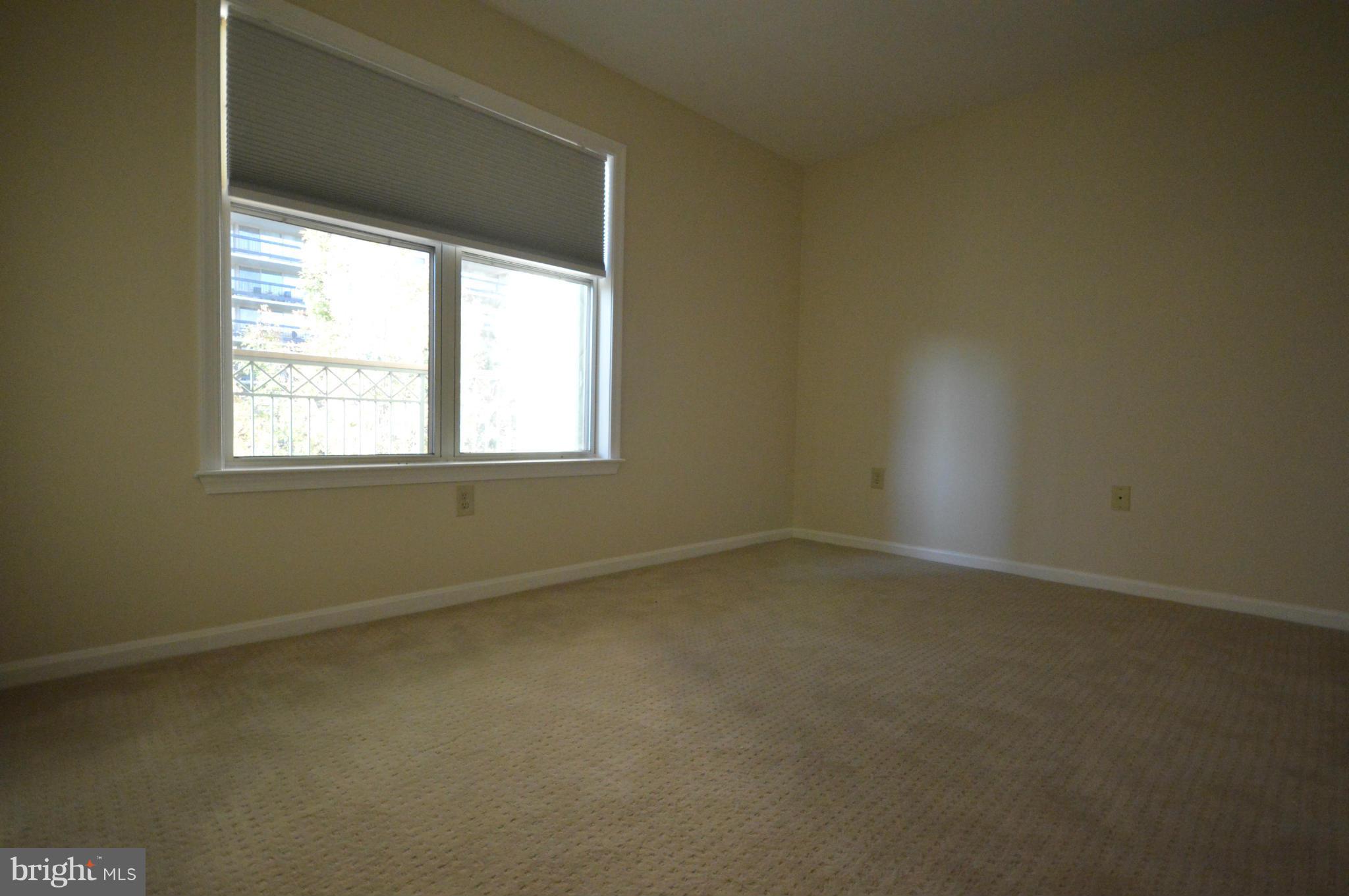5575 Seminary Road, Unit 311 Falls Church, VA 22041 - Photo 10 of 30 an empty room with a window