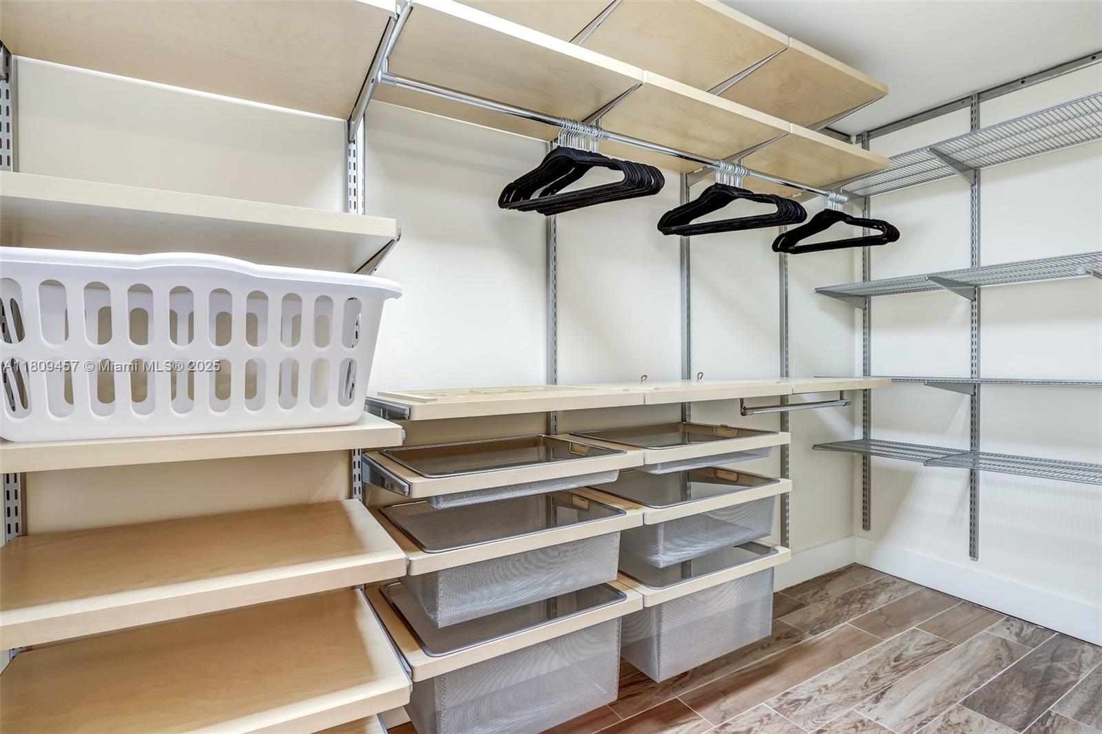 555 Southwest 27th Road Miami, FL 33129 - Photo 21 of 26 a view of walk in closet with empty racks