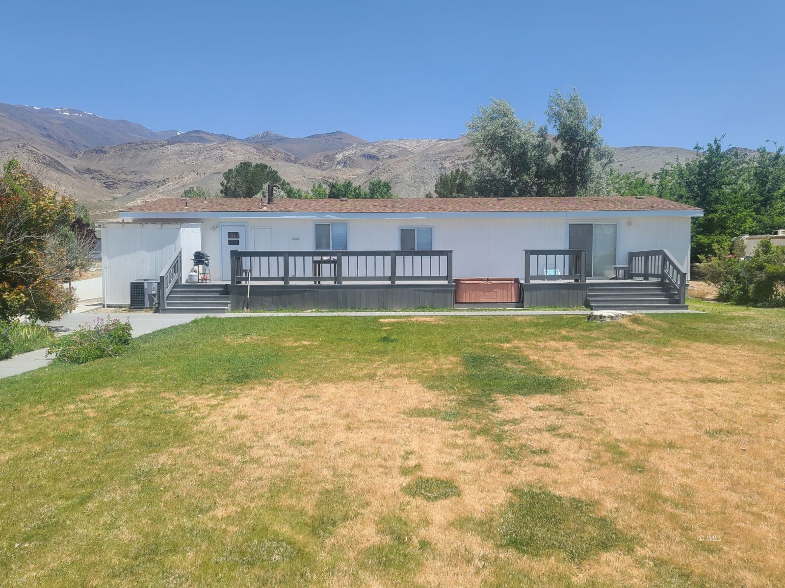 37 Sequoia Street Bishop, CA 93514 - Photo 15 of 16 a view of a house with pool and a yard