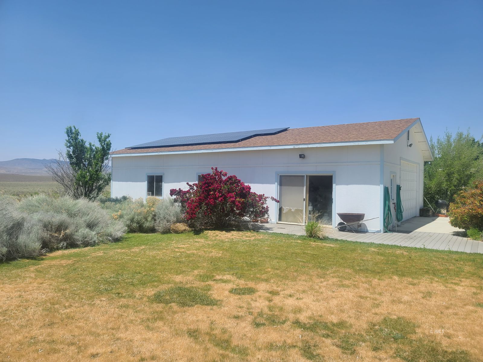 37 Sequoia Street Bishop, CA 93514 - Photo 16 of 16 a view of a house with a yard