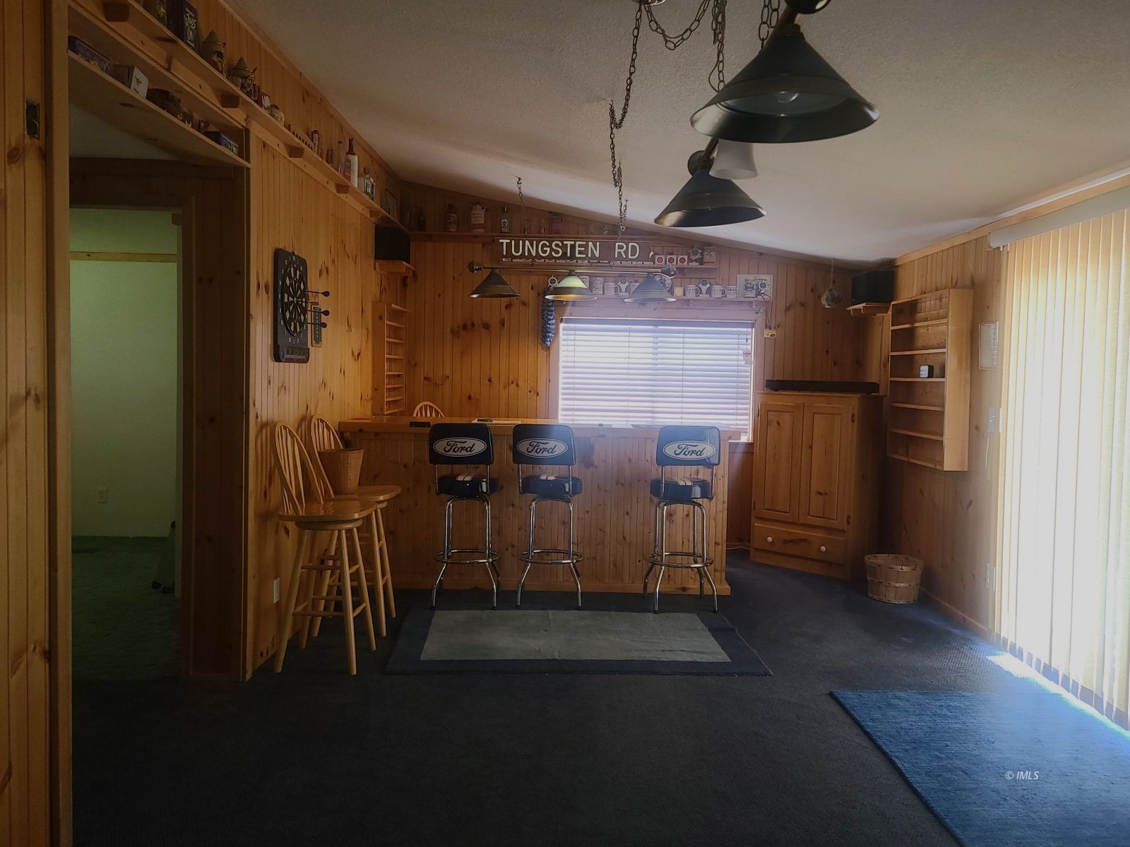 37 Sequoia Street Bishop, CA 93514 - Photo 5 of 16 a view of a room with gym equipment