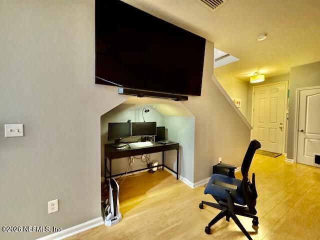 8852 Inlet Bluff Drive Jacksonville, FL 32216 - Photo 11 of 53 a room with furniture and a flat screen tv