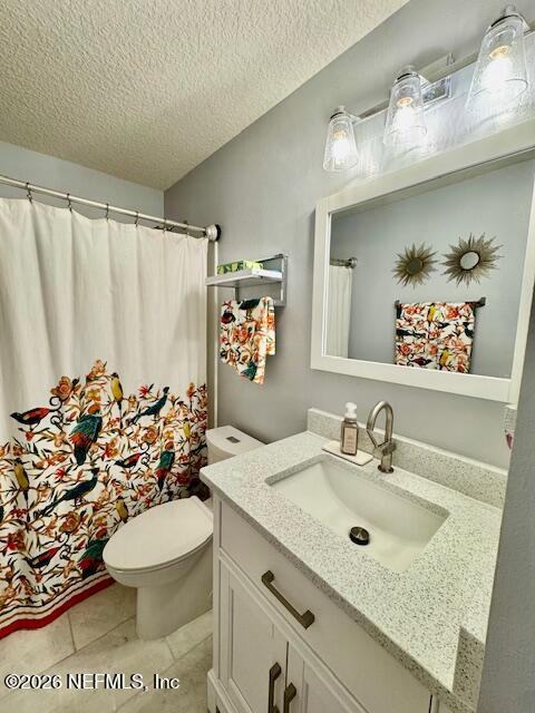 8852 Inlet Bluff Drive Jacksonville, FL 32216 - Photo 38 of 53 a bathroom with a sink a toilet and a mirror