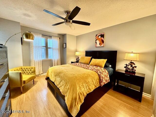 8852 Inlet Bluff Drive Jacksonville, FL 32216 - Photo 39 of 53 a bed room with a bed and a couch