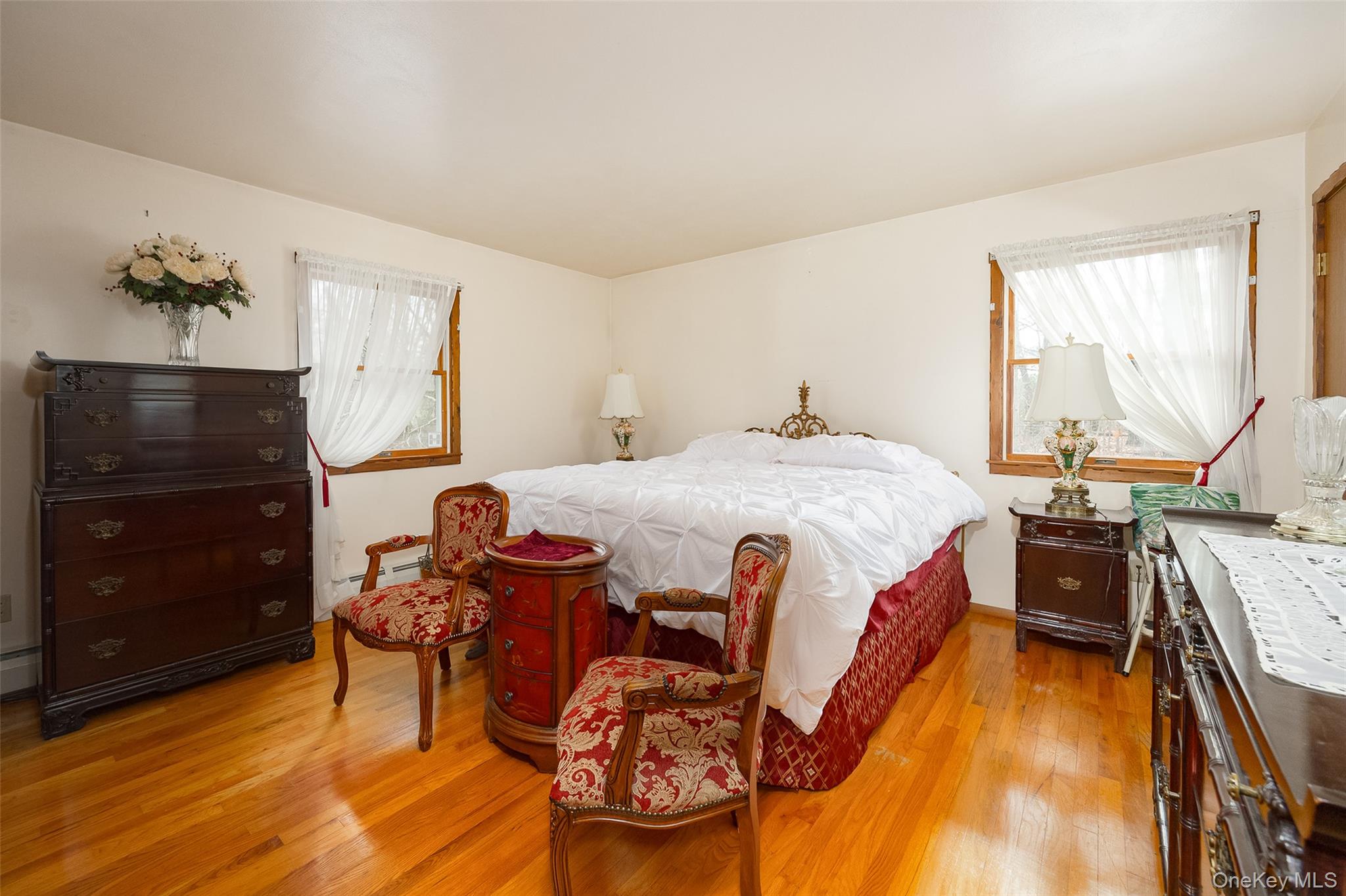 4 Kilmer Road Hyde Park, NY 12538 - Photo 11 of 36 a bedroom with a bed and wooden floor