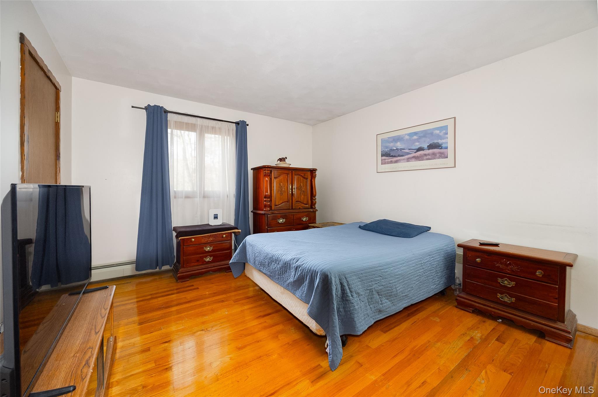 4 Kilmer Road Hyde Park, NY 12538 - Photo 14 of 36 a bedroom with a bed and dresser