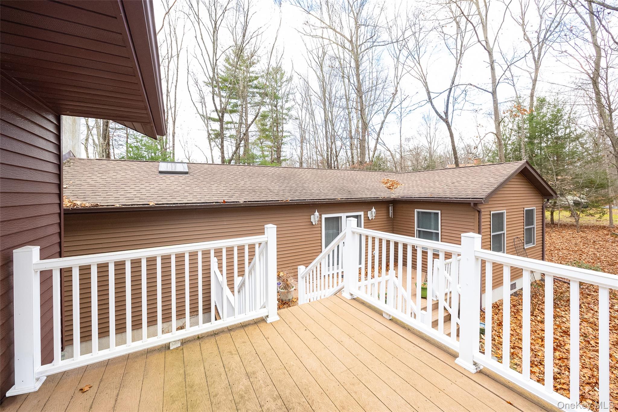 4 Kilmer Road Hyde Park, NY 12538 - Photo 32 of 36 a backyard of a house with wooden deck