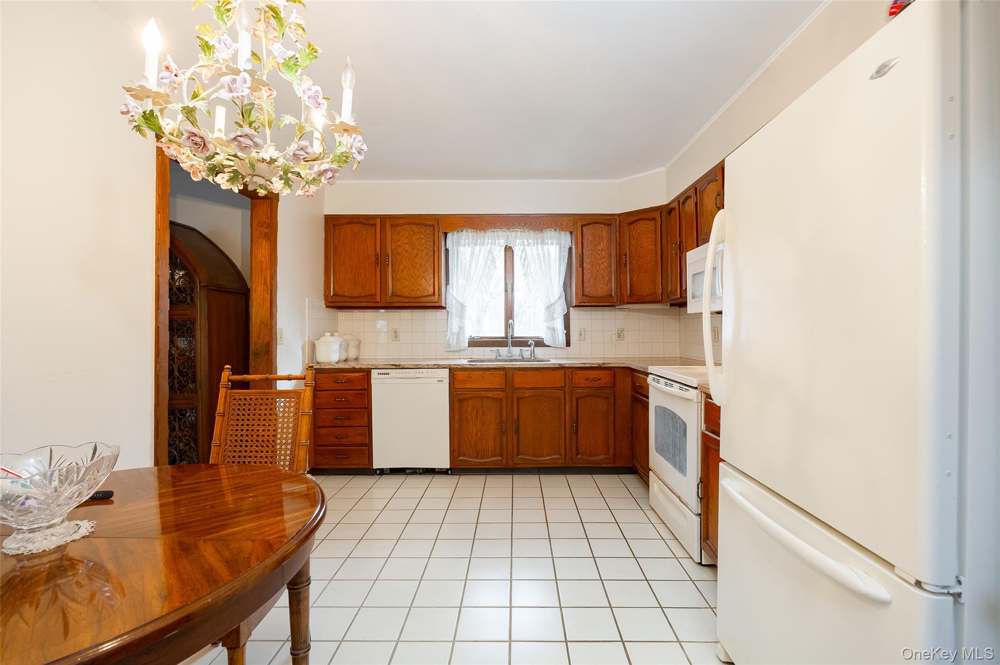 4 Kilmer Road Hyde Park, NY 12538 - Photo 10 of 36 a kitchen with a sink a stove cabinets and counter space