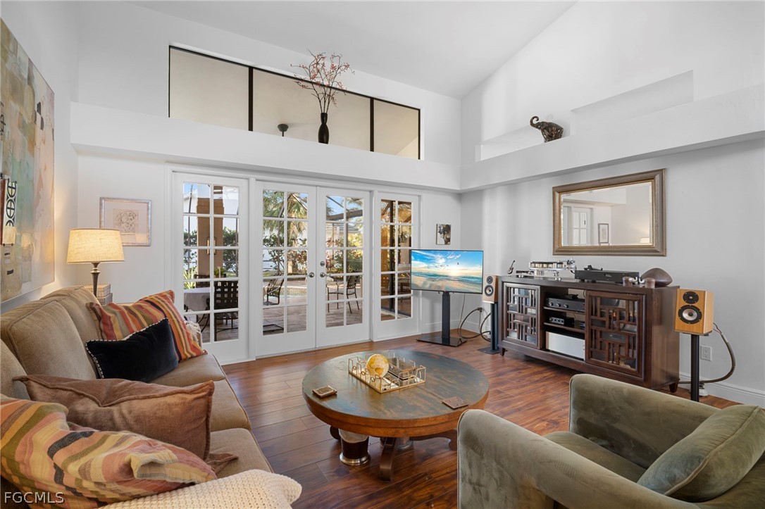 11772 Mahogany Run Fort Myers, FL 33913 - Photo 10 of 50 a living room with furniture and wooden floor