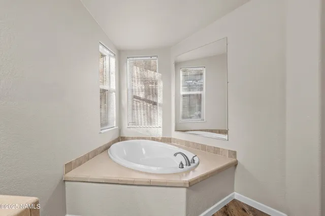 a bathroom with a sink and a bathtub