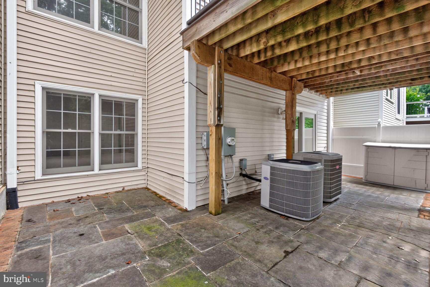11432 Cedar Ridge Drive Potomac, MD 20854 - Photo 26 of 32 Charming outdoor space with utility access.