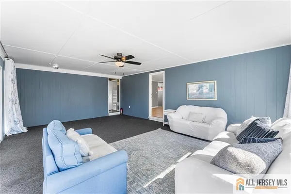 a living room with furniture and a couch