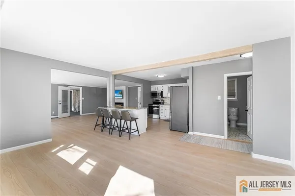 a view of a livingroom with furniture and window