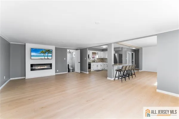 a view of a livingroom with furniture and with furniture