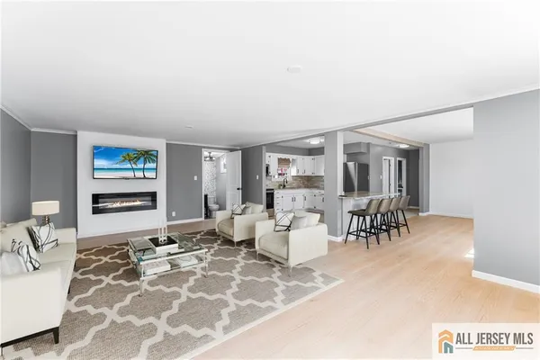 a living room with furniture and a table