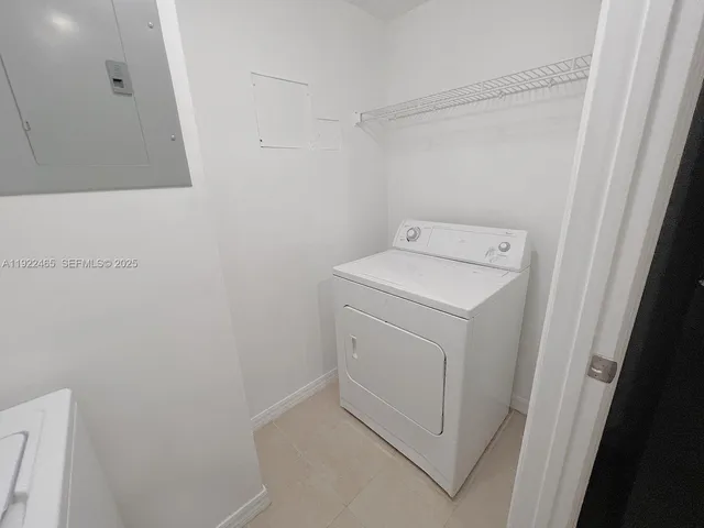 a view of a swimming pool with outdoor seating