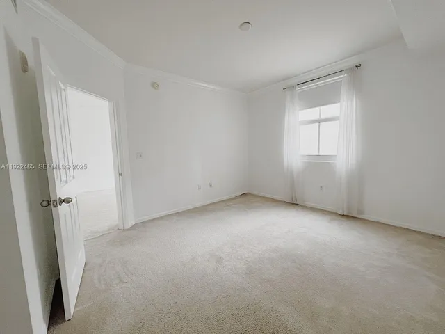 a bathroom with a toilet and a bathtub