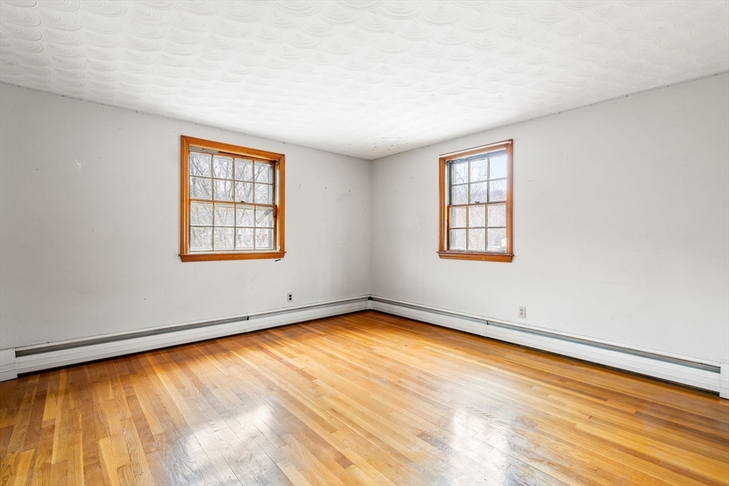 154 Birch Street Braintree, MA 02184 - Photo 22 of 38 an empty room with windows