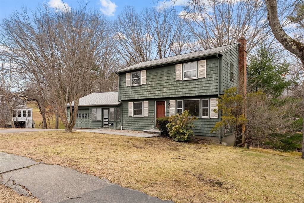 154 Birch Street Braintree, MA 02184 - Photo 35 of 38 a front view of a house with a yard